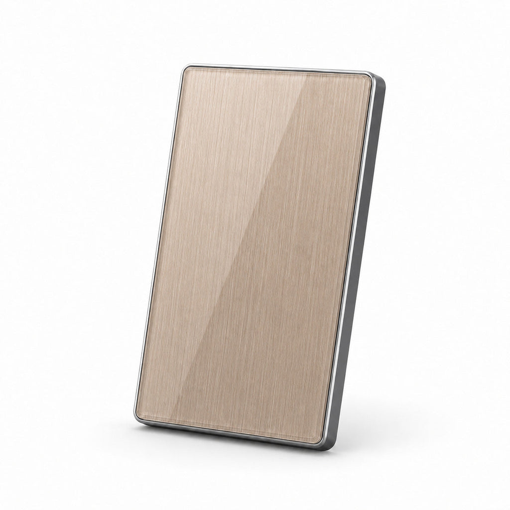 JINK Switch 2.5D US standard brushed warm gold panel with silver aluminum frame — standardized 1x1 media