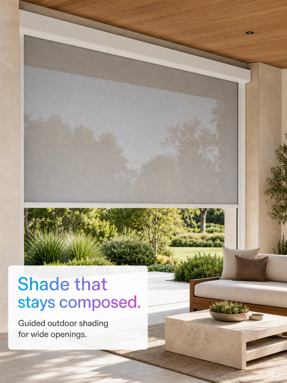 JINK Gale guided exterior roller shade filtering daylight on a terrace