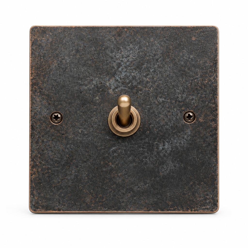 JINK Switch PATINA copper toggle switch, front view on white