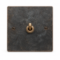 JINK Switch PATINA copper toggle switch, front view on white